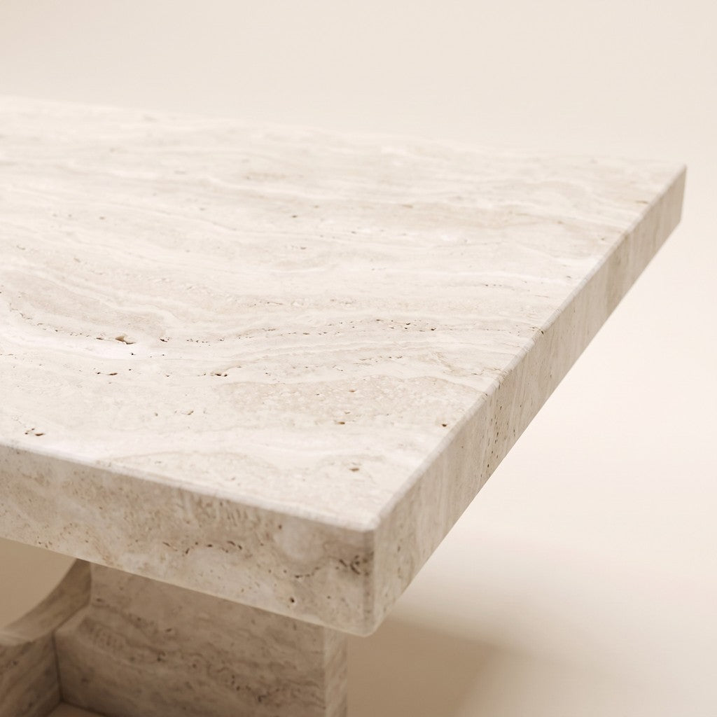 Cut-Out Leg White Travertine Coffee Table: close-up of the stone surface