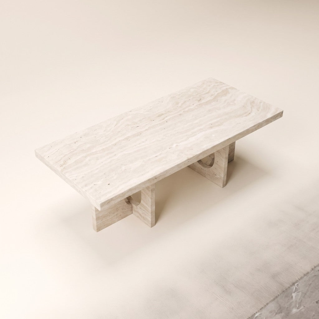 Cut-Out Leg White Travertine Coffee Table, three-quarter view