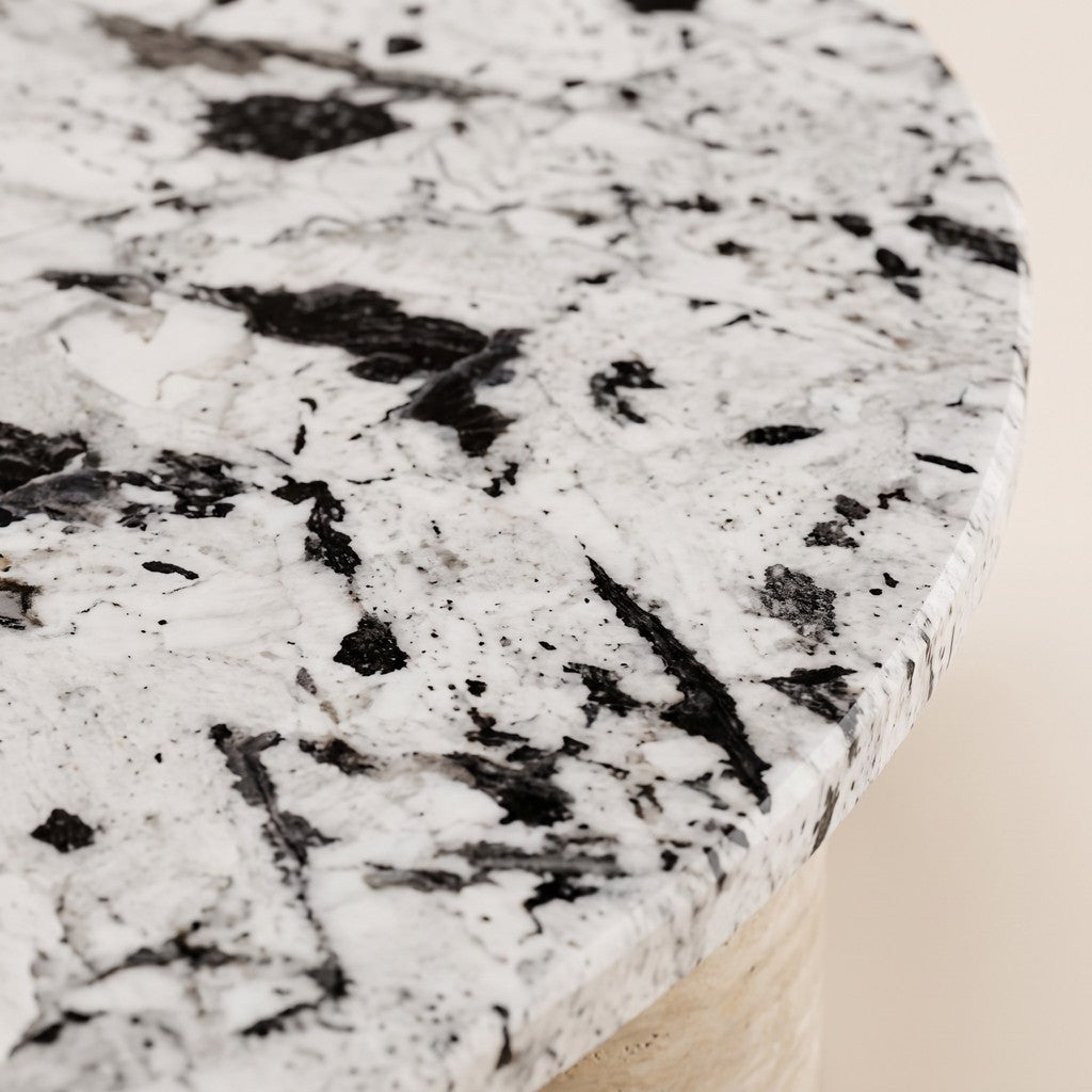 Half-Moon Coffee Table — Speckled Stone Top, Travertine Legs: close-up of the stone surface