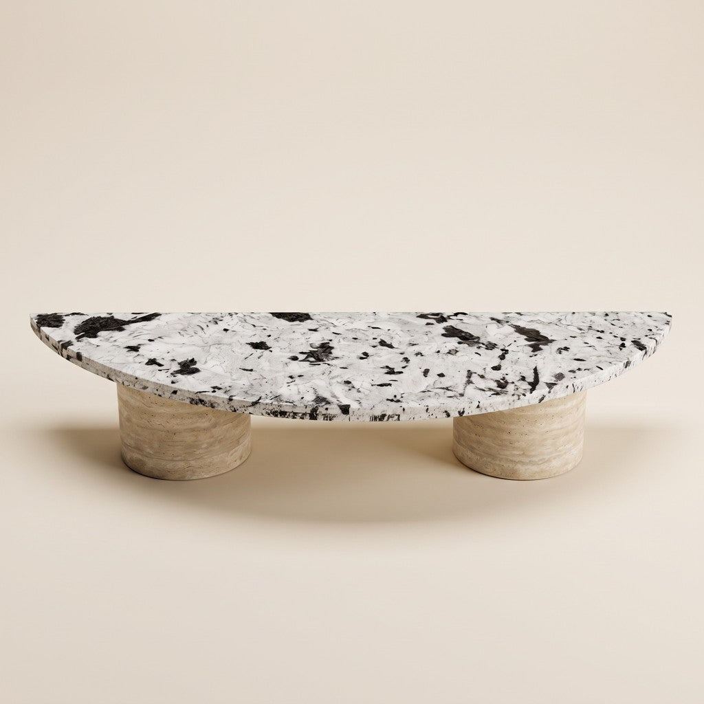 Half-Moon Coffee Table — Speckled Stone Top, Travertine Legs, studio view