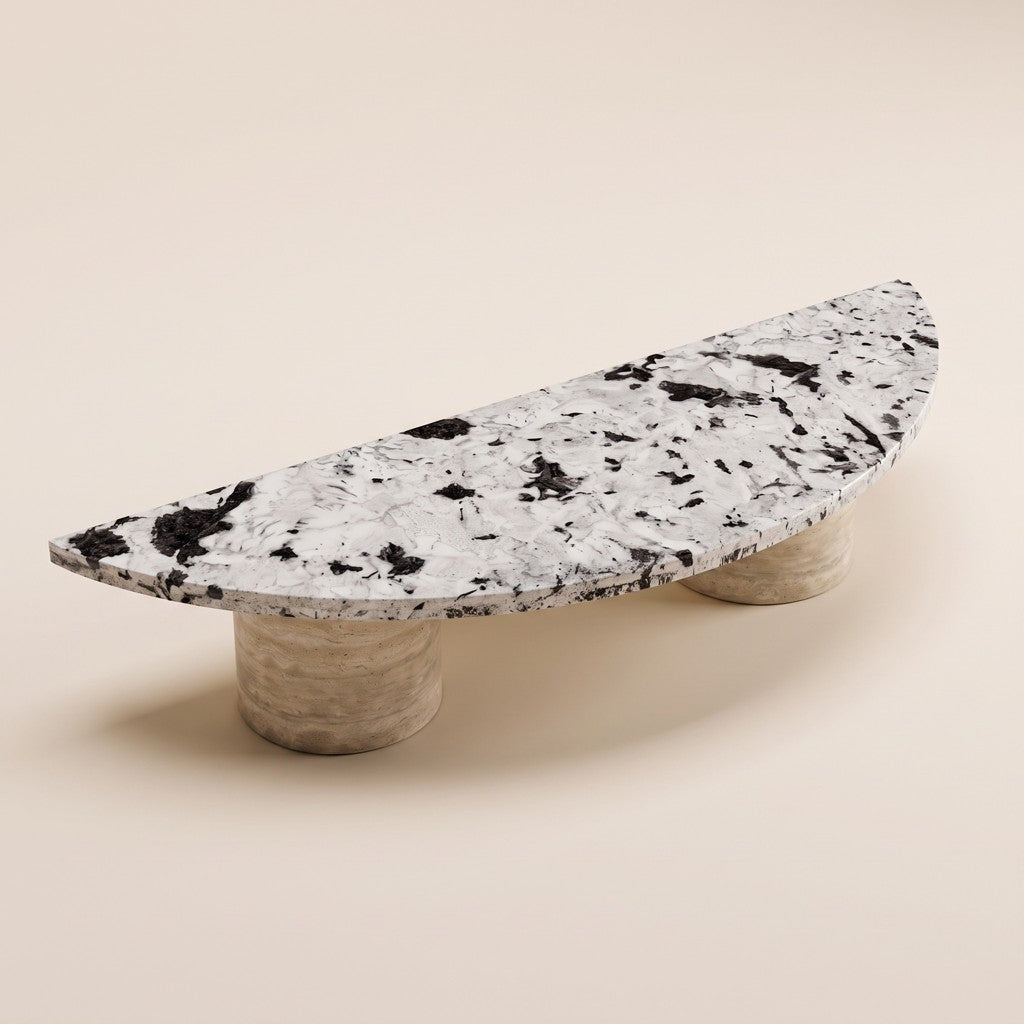 Half-Moon Coffee Table — Speckled Stone Top, Travertine Legs, three-quarter view
