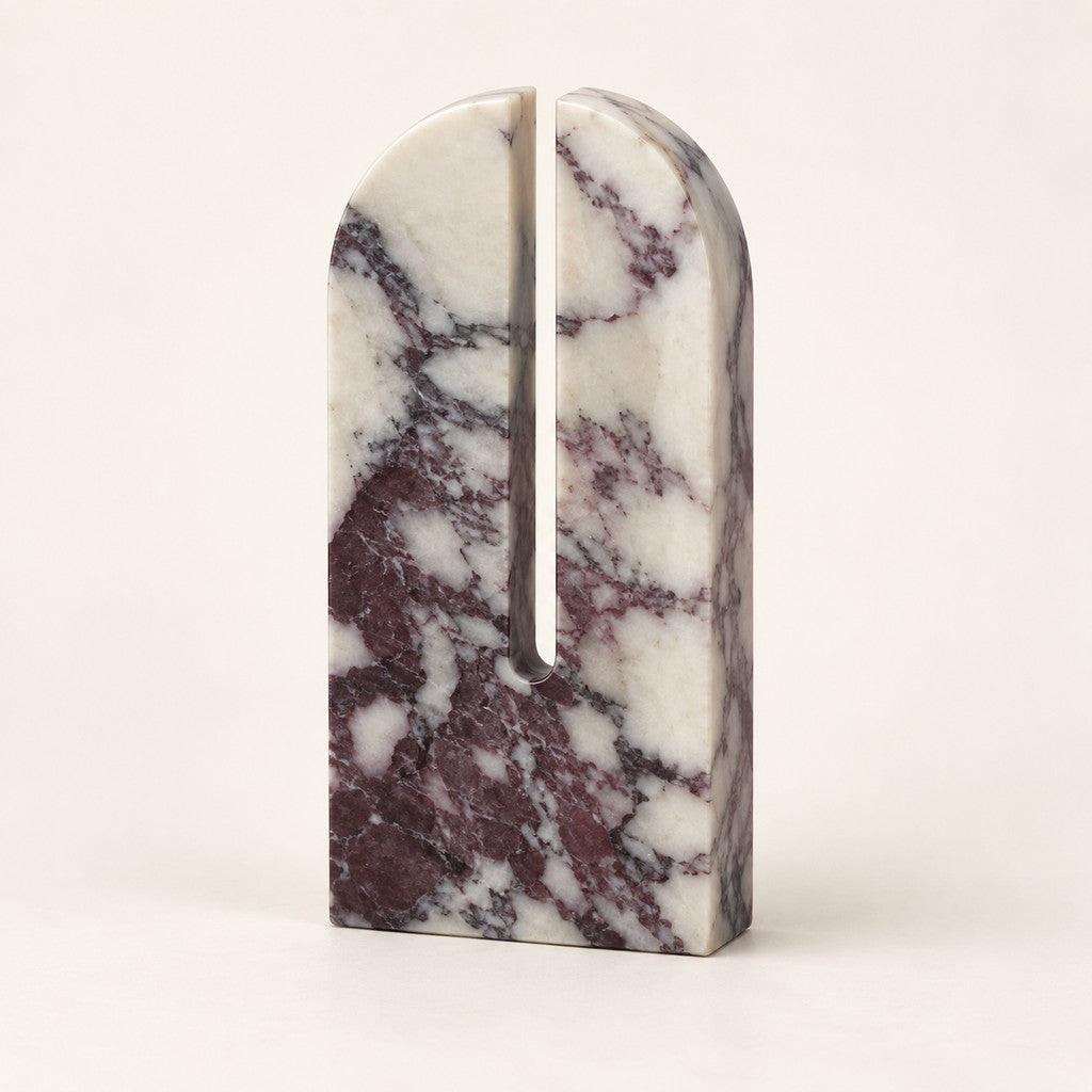 Large Arched Stone Ornament in Calacatta Viola, studio view