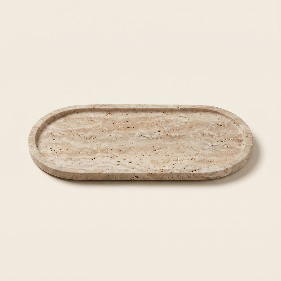 Low-Rim Oval Tray in Beige Travertine, studio view