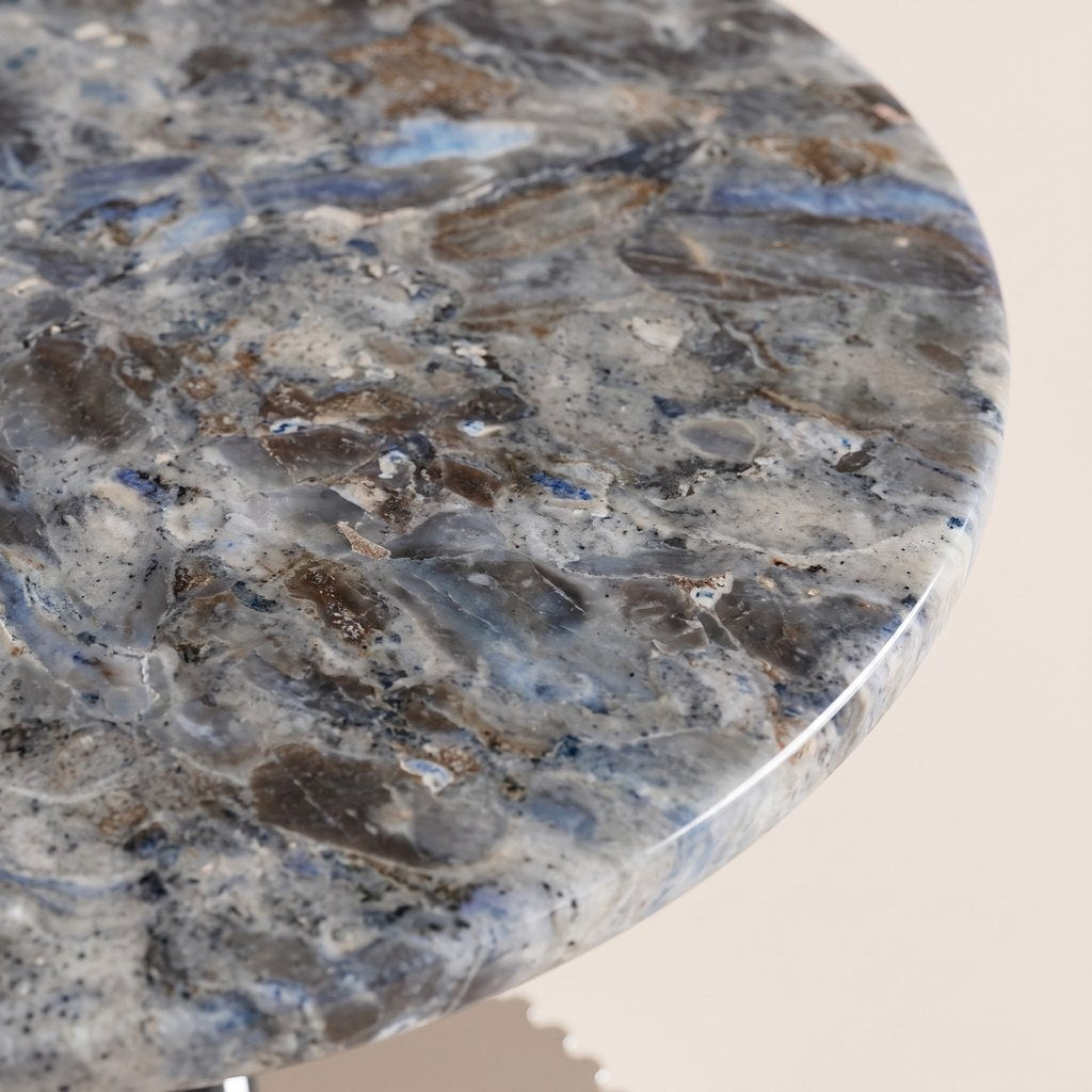 Blue-Grey Marble Side Table — Fluted Chrome Base: close-up of the blue-grey marble surface