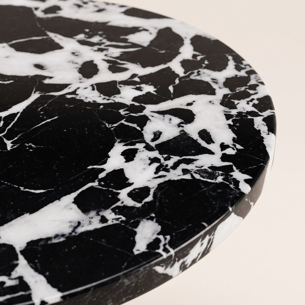 Metal-Pedestal Nero Marquina Side Table: close-up of the Nero Marquina marble surface