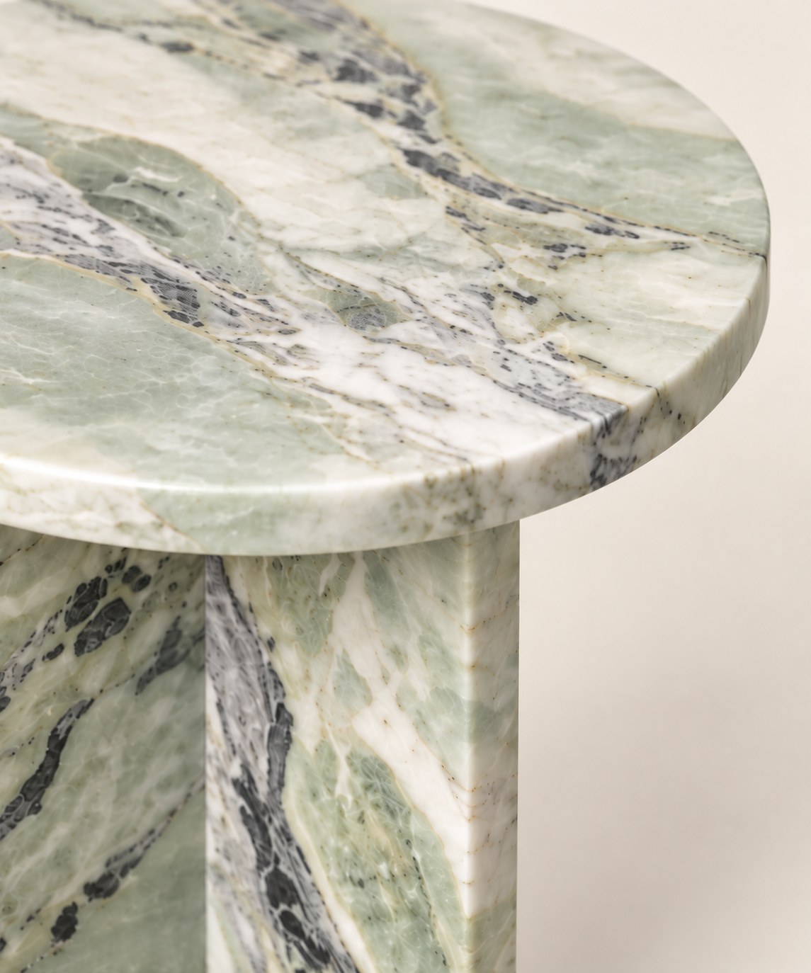 Fendi Green round cross-base side table — stone material close-up
