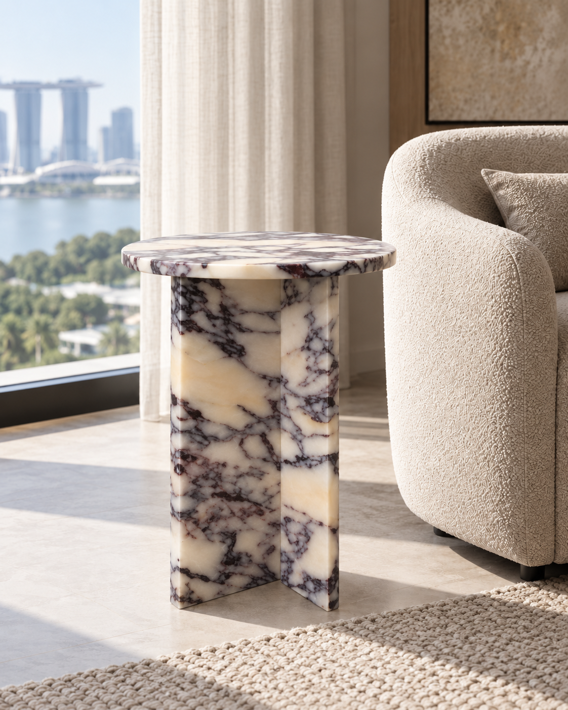 Round T-Base Side Table in Calacatta Viola — Singapore interior view.