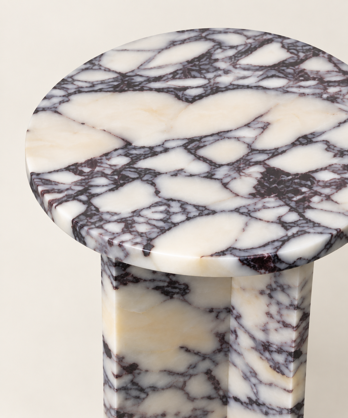 Round T-Base Side Table in Calacatta Viola — tabletop and edge detail view.