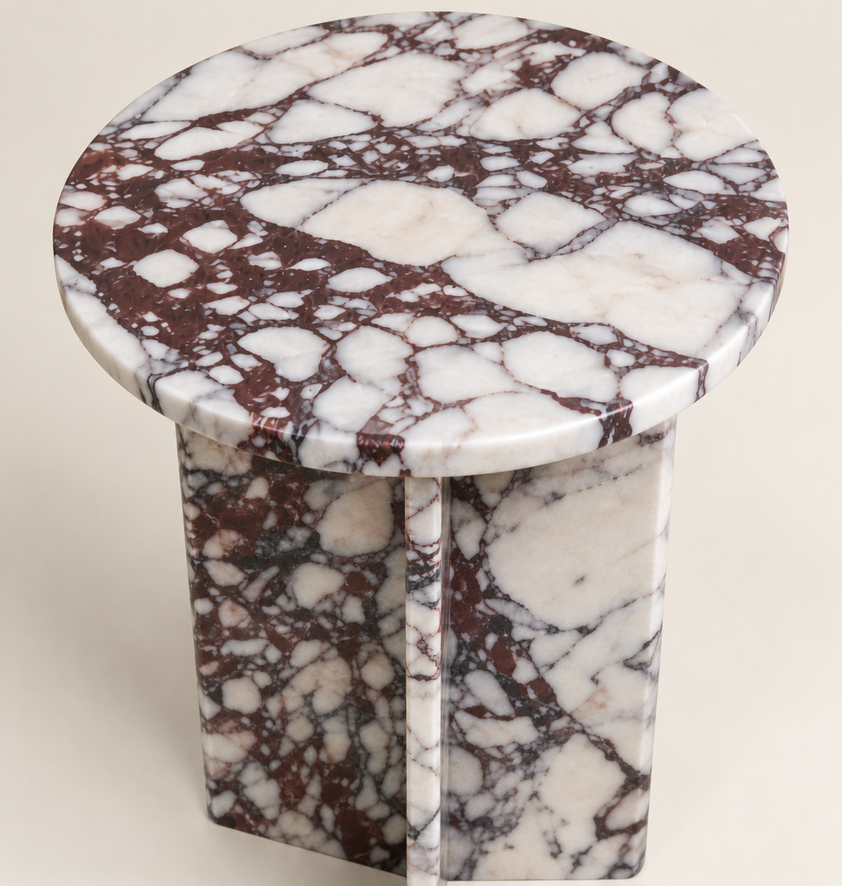 Round Drum Side Table in Calacatta Viola — close elevated detail of the round top and edge.
