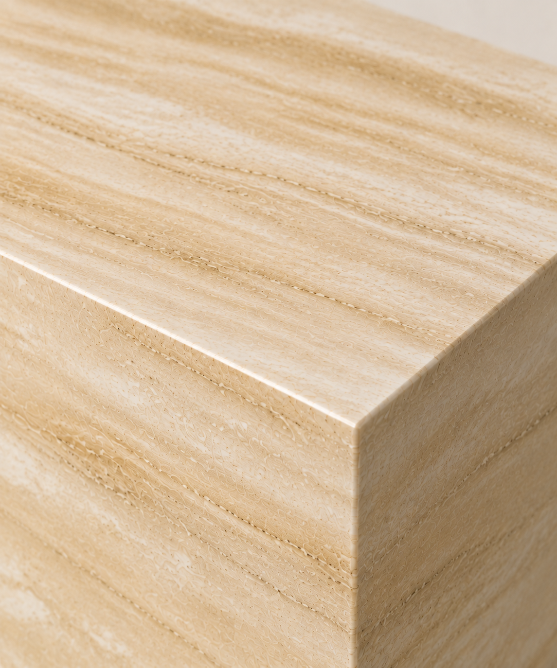 FSF-056 smooth sintered stone macro detail of the top corner and edge, showing flat beige-gold horizontal mineral pattern without pores.