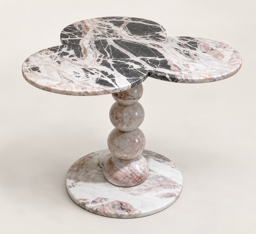 Three-Lobed Pedestal Side Table in grey, black, white and pink natural stone, studio packshot three-quarter view.