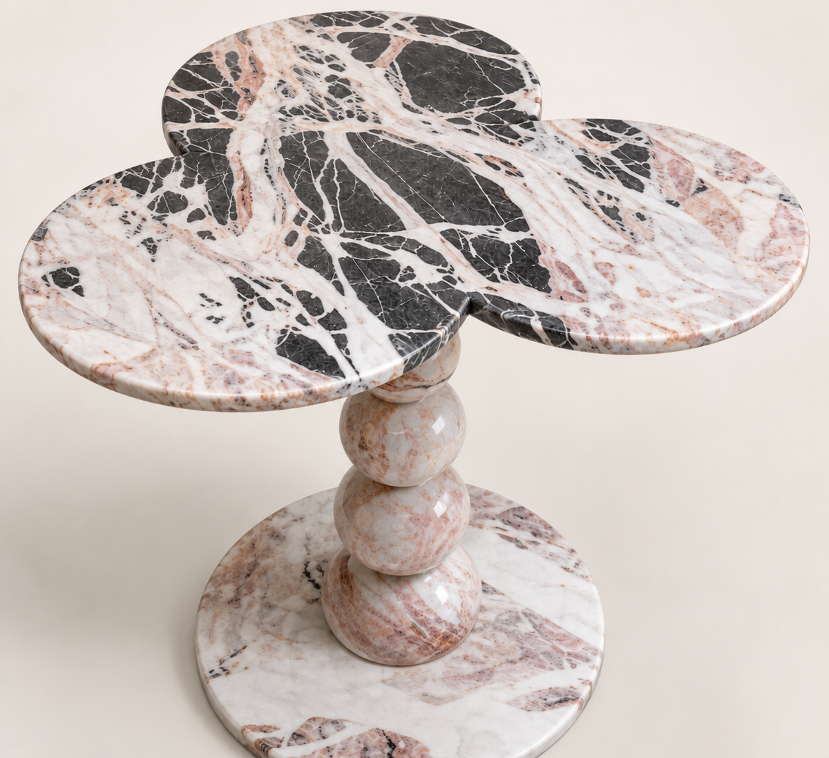 Three-Lobed Pedestal Side Table structure view showing the three-lobed top, turned rounded pedestal and circular stone base.