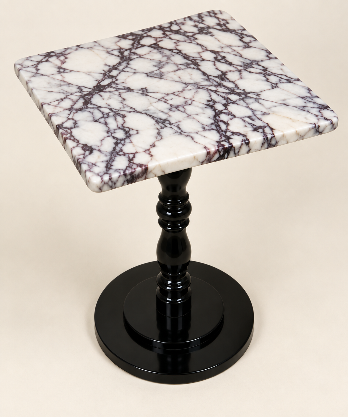 Square Baluster-Pedestal Side Table in Calacatta Viola — elevated studio structure view with glossy black pedestal and disc base.