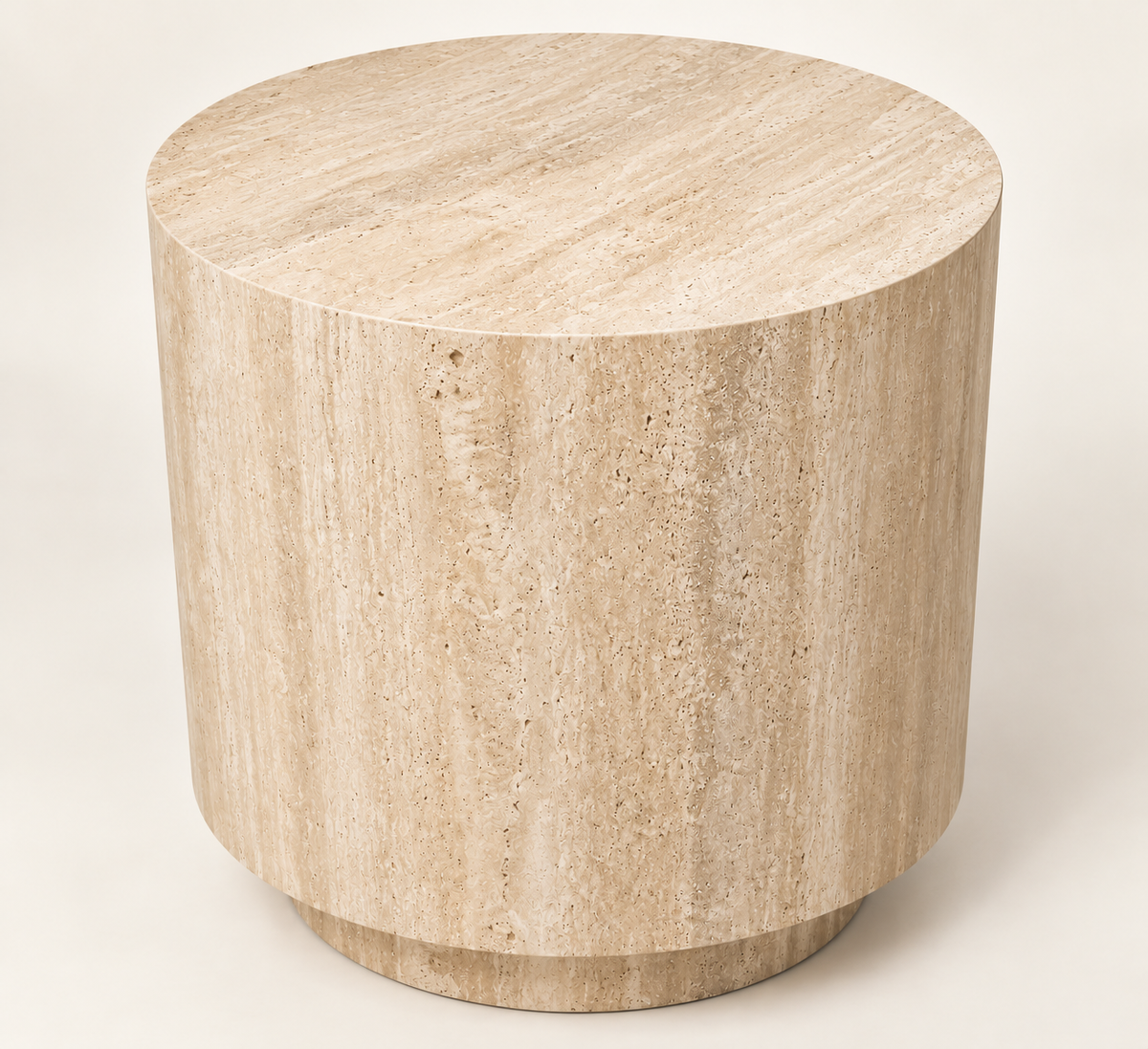 Smooth Drum Travertine Side Table in beige travertine, close studio structure view.