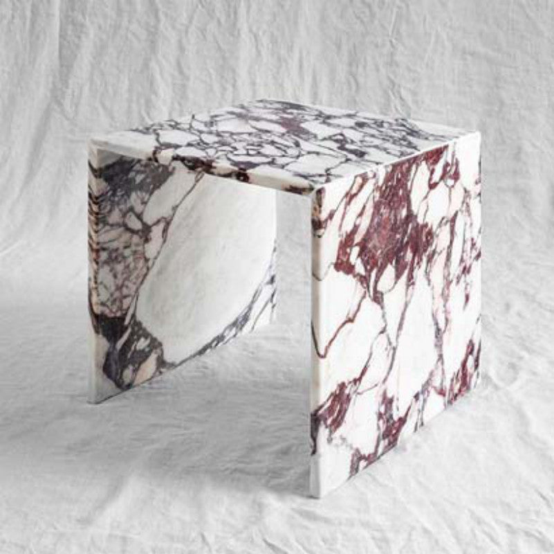 White and purple-veined stone side table with a square top and straight slab sides