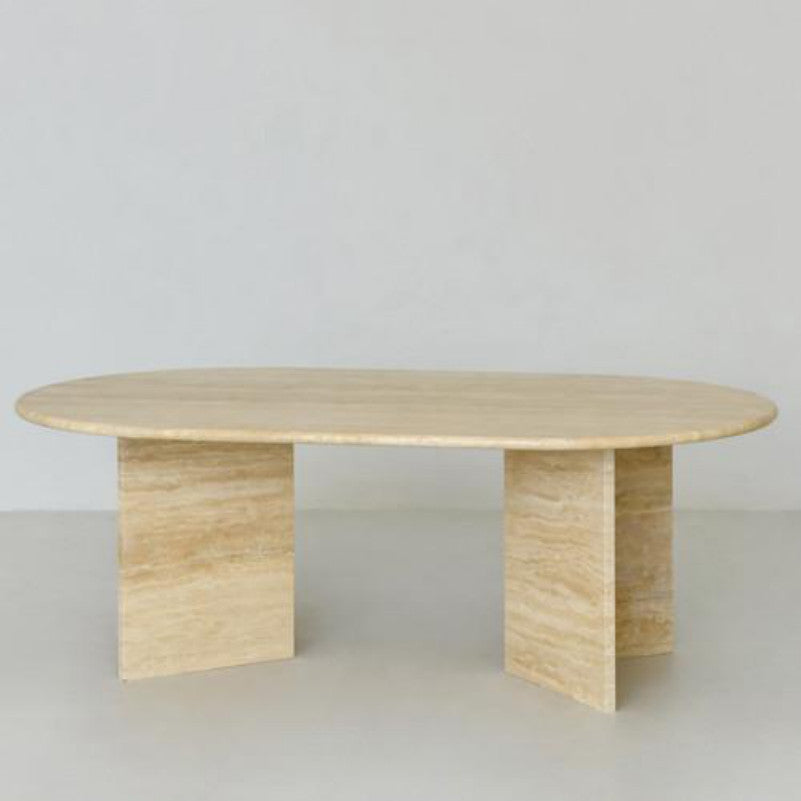 Golden-beige stone console with an oval top and paired slab supports