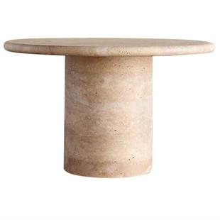 Round beige stone dining table with a cylindrical pedestal, front view