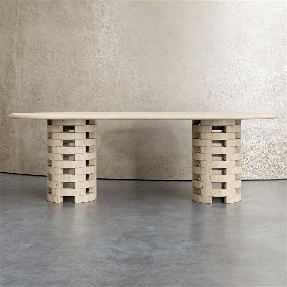 Pale stone dining table with two open lattice supports, front view