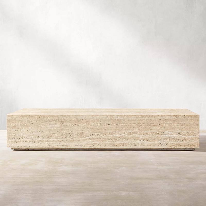 Rectangular beige stone plinth coffee table with horizontal banding, front view