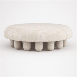Round pale stone coffee table with a thick rounded top and a ring of short cylindrical legs