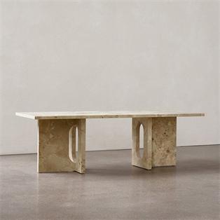 Rectangular pale stone coffee table with two open slab supports, front view