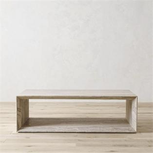 Rectangular pale stone coffee table with an open lower shelf, front view