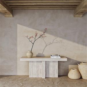 Pale banded stone console with a broad slab pedestal beneath a wall mirror