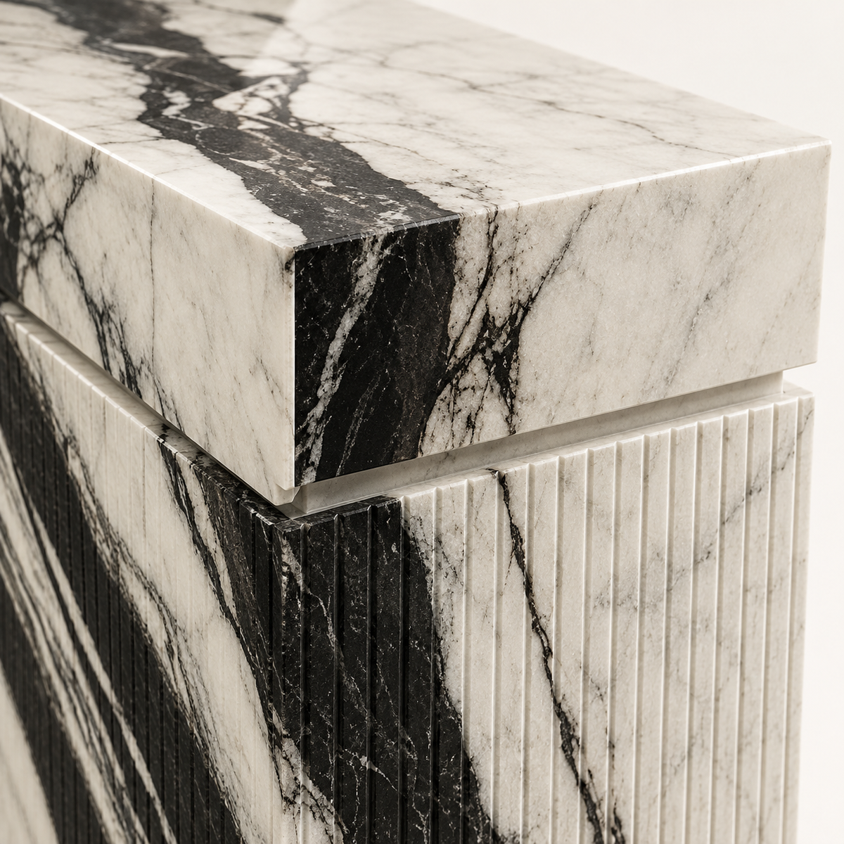 Panda White marble veining and vertical fluting detail