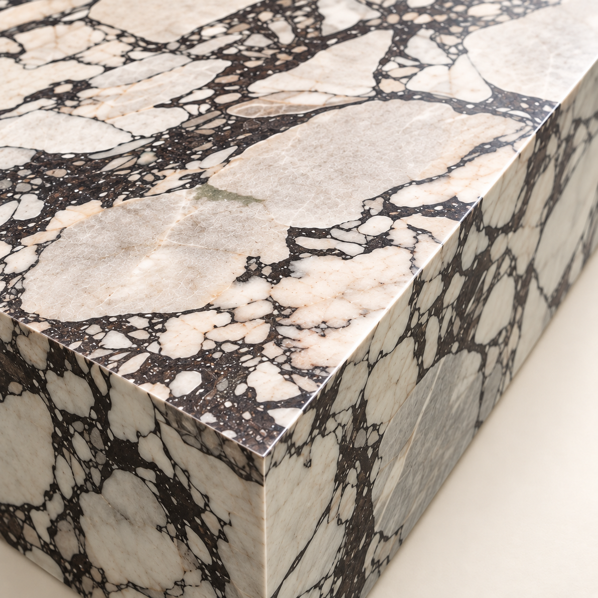 Close-up of the Viola Plinth MS-02 Turkish Calacatta Viola marble surface and straight polished edge.