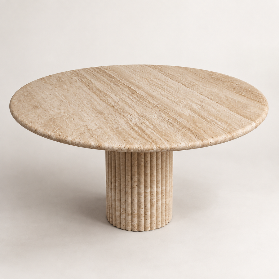 Fluted round light beige travertine dining table, three-quarter studio view