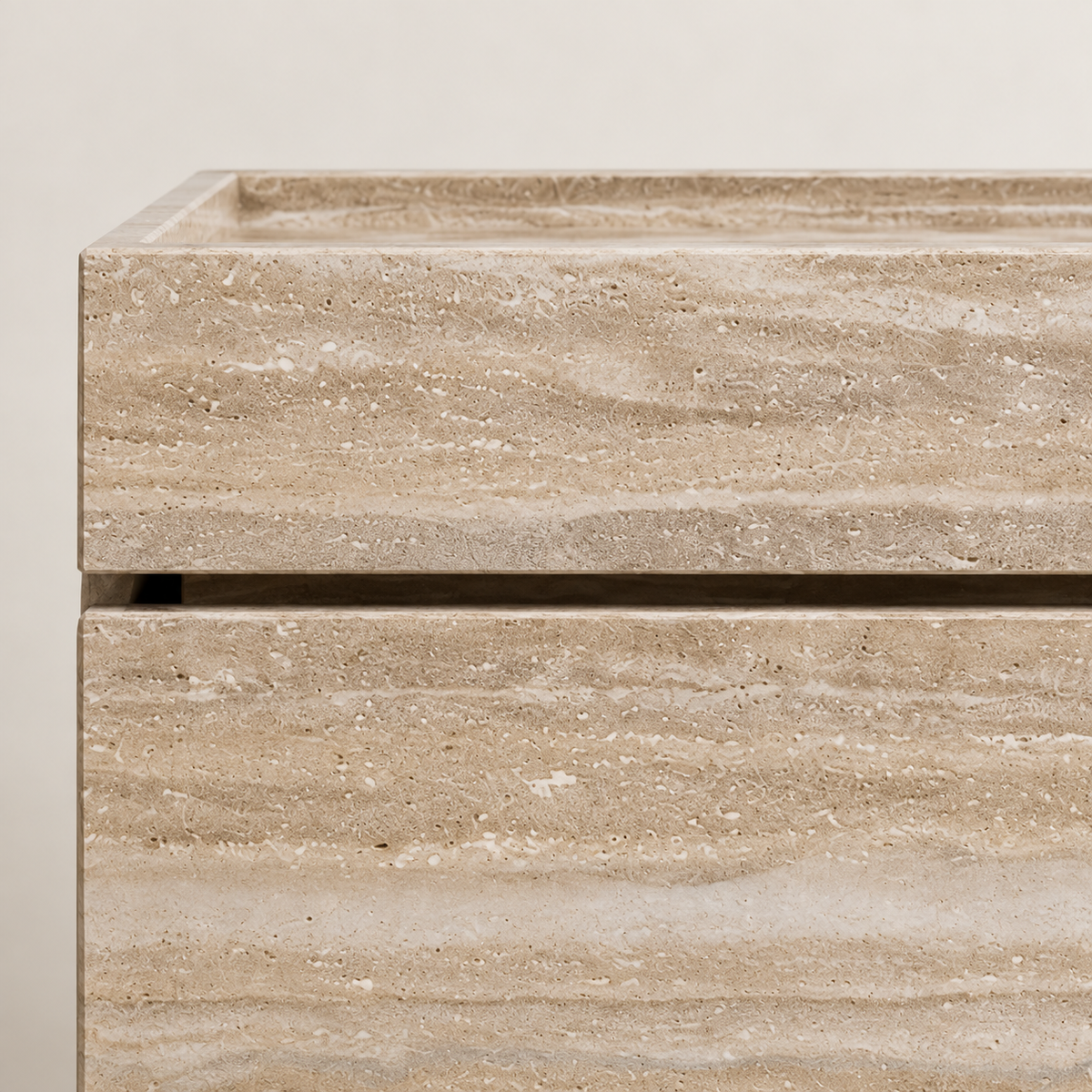 Close-up of the upper front edge and first recessed line of the Light Beige Travertine Single Vanity.