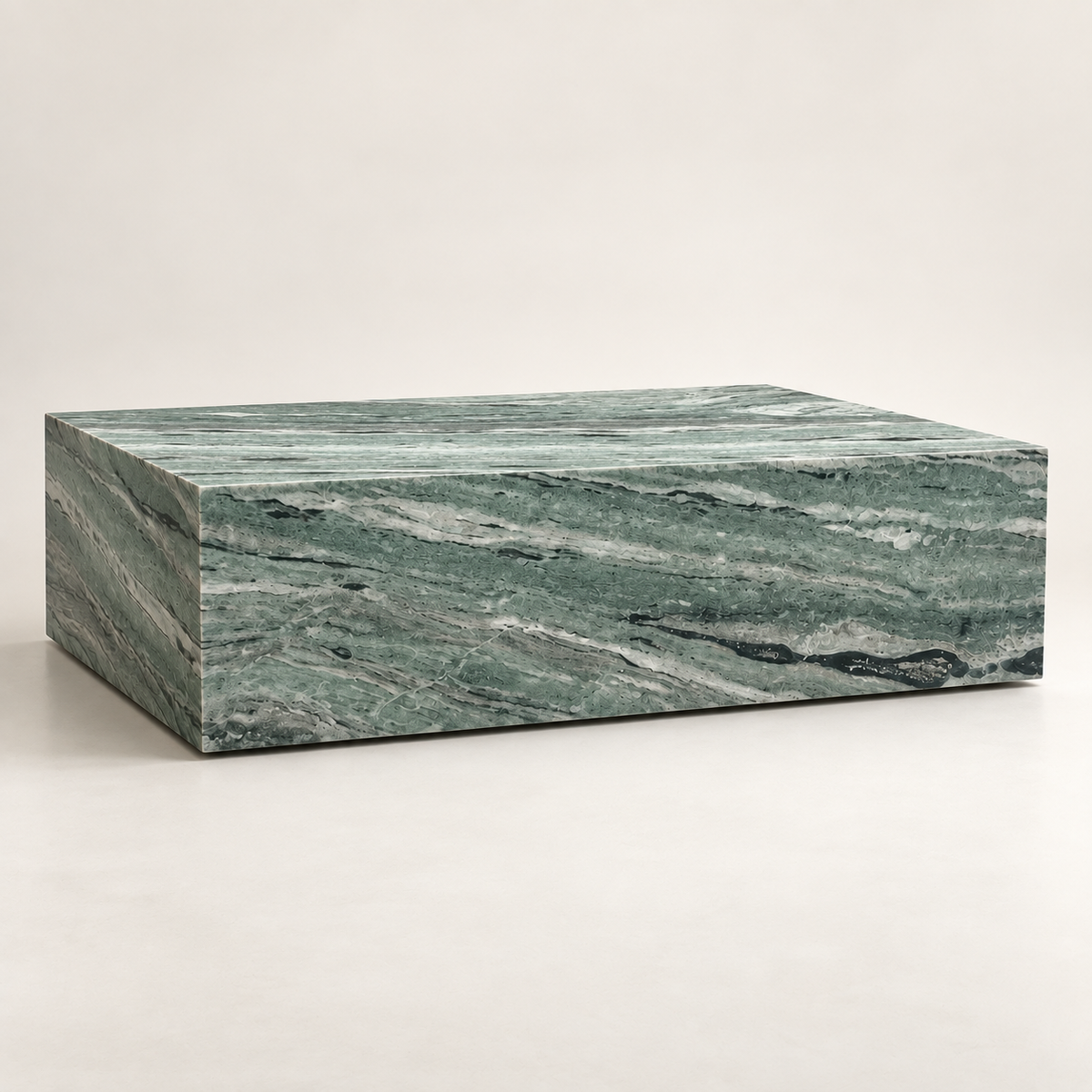 Shangri La Green Plinth Coffee Table, low-angle studio view showing the long face and side.