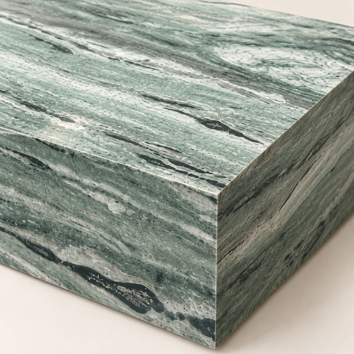 Close-up of the Shangri La Green Plinth Coffee Table stone surface and crisp corner detail.