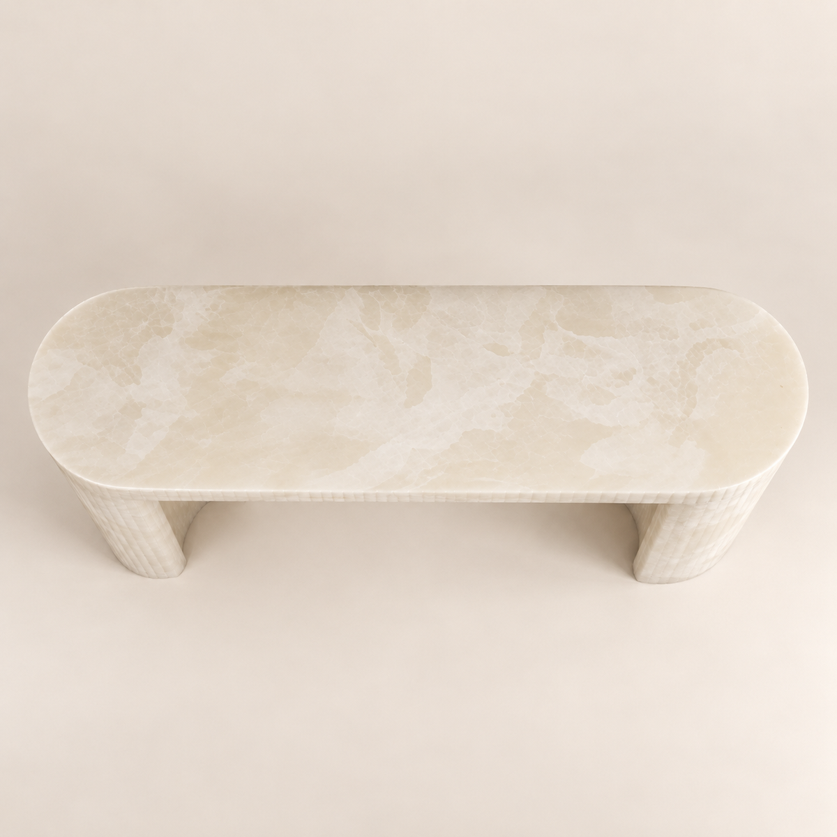 Top view of the White Onyx Console Table showing its capsule-shaped onyx surface.