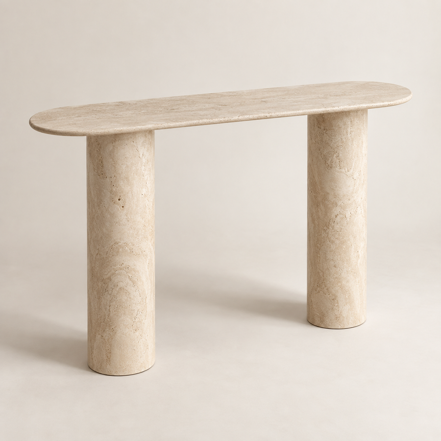 White Beige Travertine Console Table in an ivory studio, three-quarter view showing the slim rounded top and two smooth cylindrical supports.