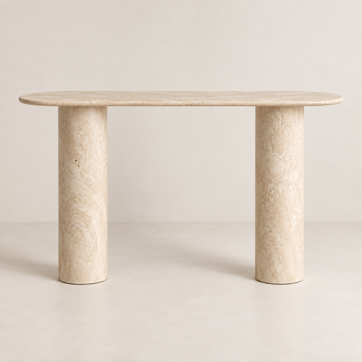 Front view of the White Beige Travertine Console Table showing its slim rounded top and two tall smooth cylindrical supports.