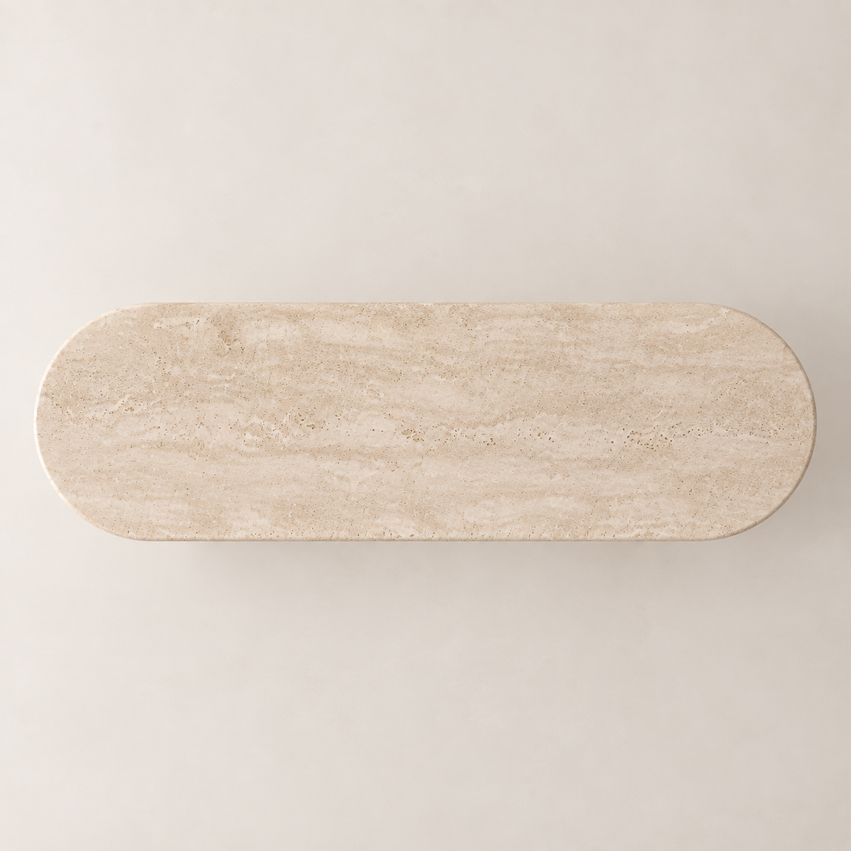 Top view of the White Beige Travertine Console Table showing the elongated rounded travertine tabletop.