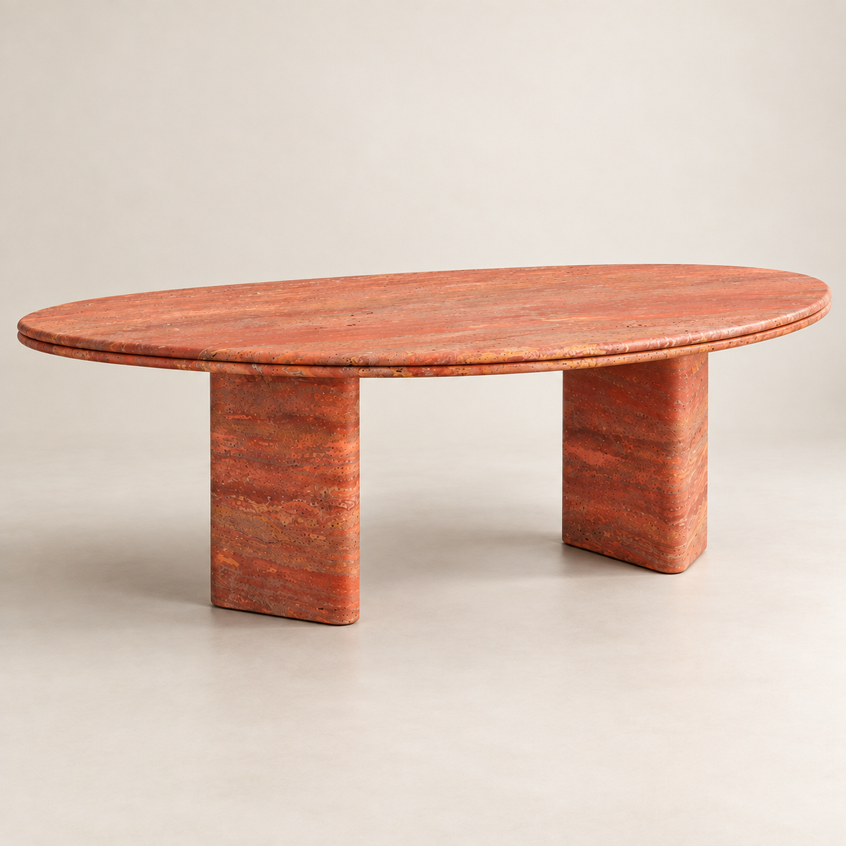 Red Travertine Dining Table MS-12, low front three-quarter studio view showing the two broad stone legs.