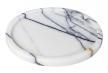 Round white stone tray with fine grey veining, viewed from above