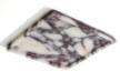 Square cream stone tray with dark purple veining, three-quarter view