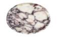 Round cream stone tray with dark purple veining, viewed from above