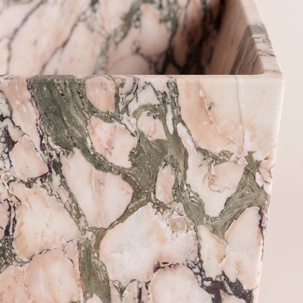 One-Piece Pink Marble Pedestal Basin: close-up of the pink marble surface