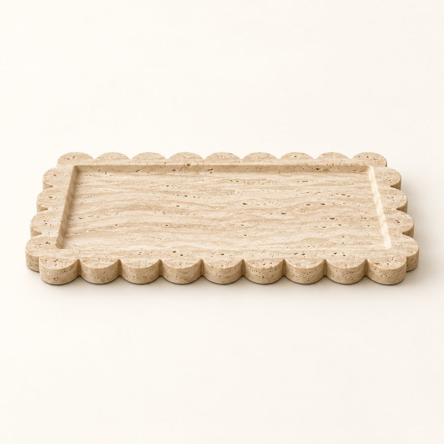 Petal-Edge Rectangular Tray in Beige Travertine, studio view