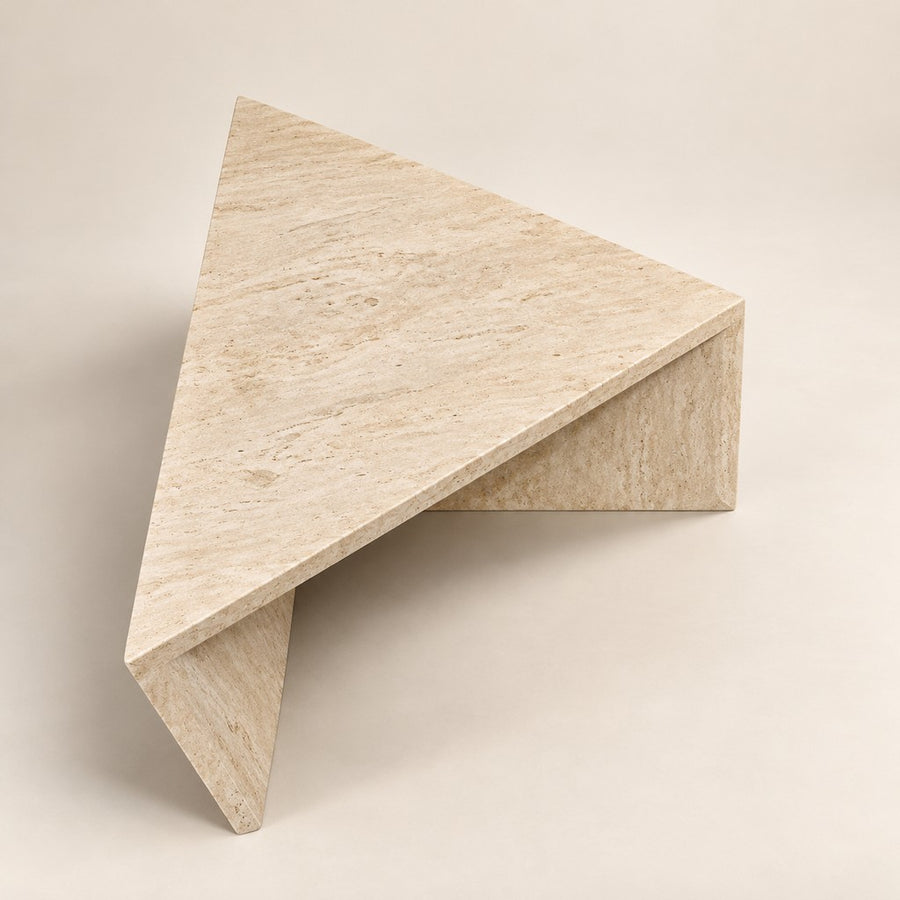 Raised Folded Travertine Coffee Table in beige, studio view