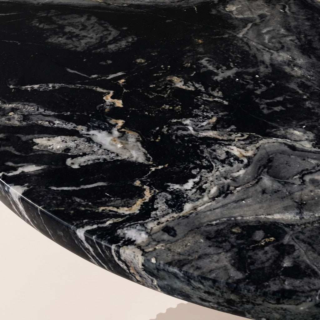 Round Black Marble Side Table — Chrome Pedestal: close-up of the stone surface