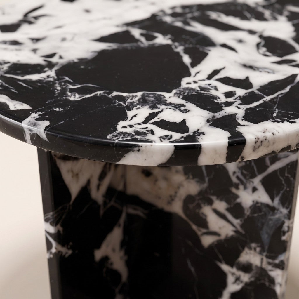 Round Black-and-White Marble Side Table — Cross Base, edge detail