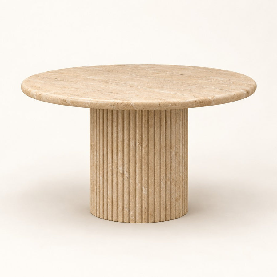 Round Travertine Dining Table — Fluted Pedestal, beige travertine, studio view