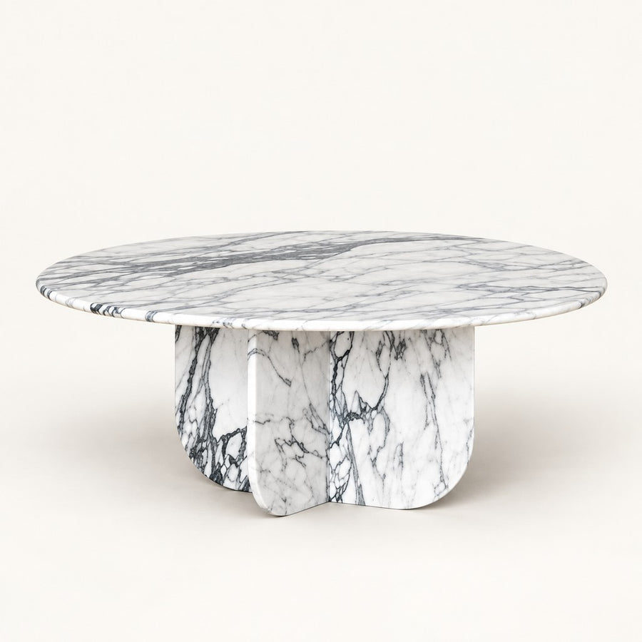 Round White Marble Coffee Table — Petal Base, studio view