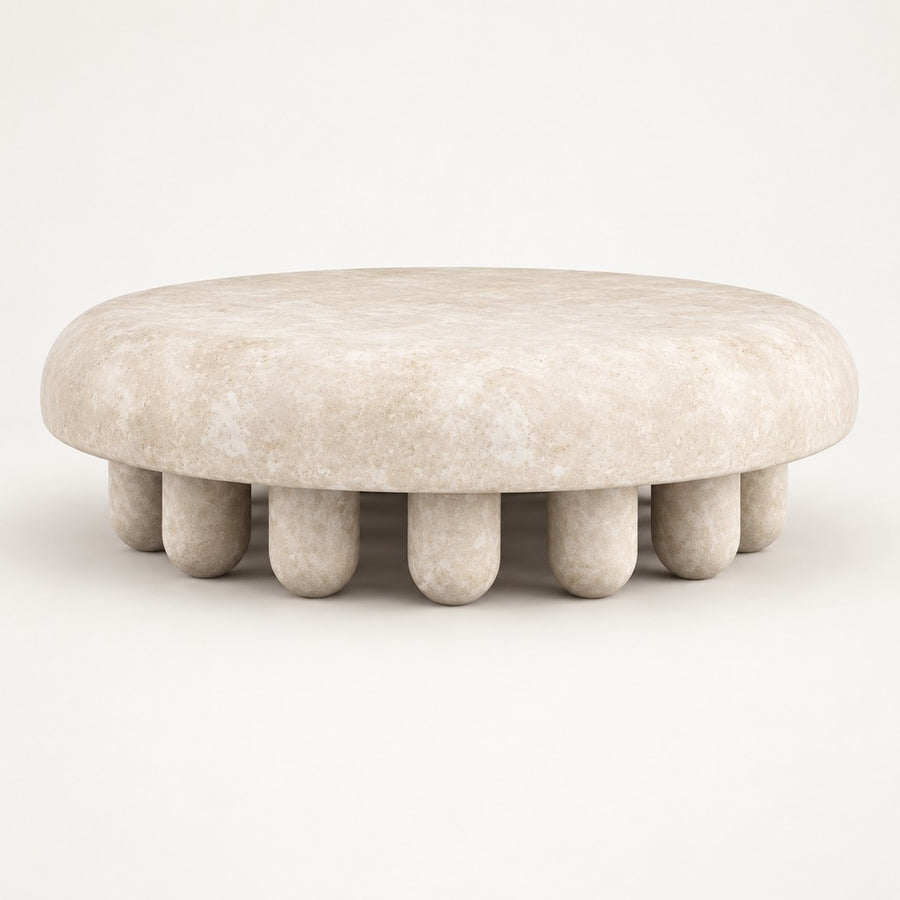 Round Travertine Coffee Table — 100 × 40 cm, beige travertine, studio view