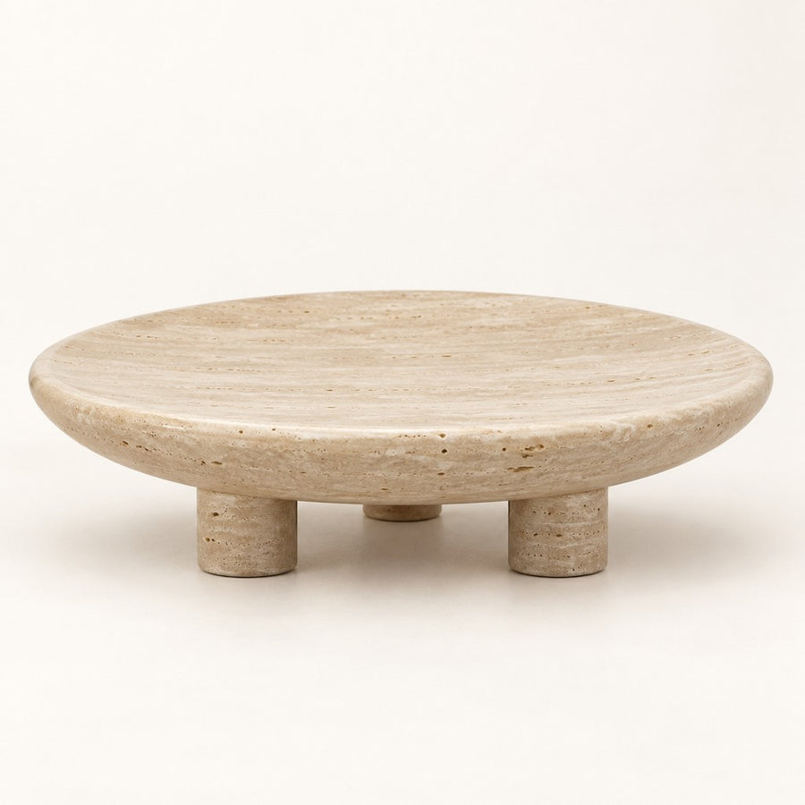 Round Tray with 3 Legs in Beige Travertine, studio view